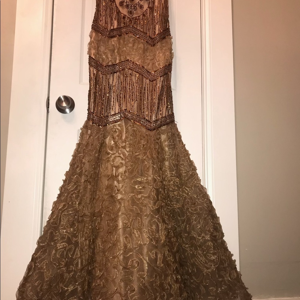 Gorgeous beaded mermaid gown.